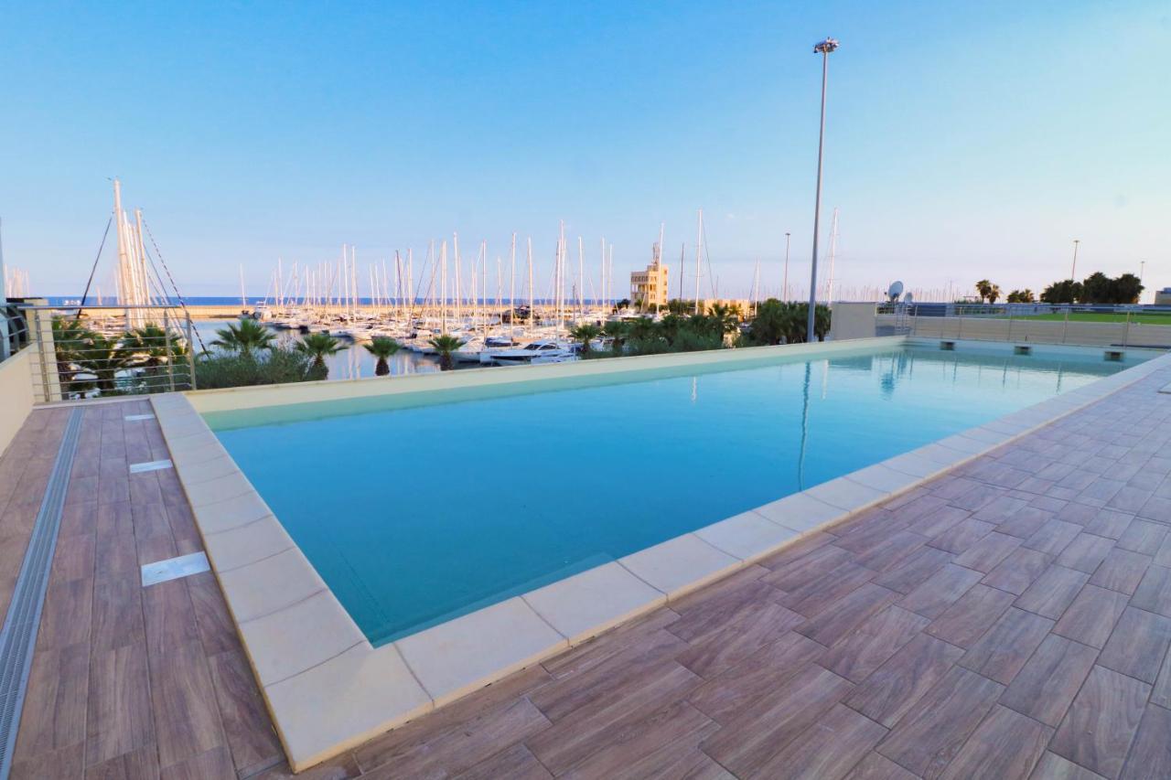 H11 Luxury 9A - Porto - Piscina - Jacuzzi Appartement Santo Stefano al Mare Buitenkant foto