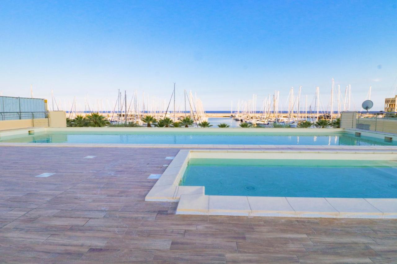 H11 Luxury 9A - Porto - Piscina - Jacuzzi Appartement Santo Stefano al Mare Buitenkant foto